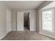 Bedroom with neutral walls and carpeted floors at 847 Ashley Ln, Stone Mountain, GA 30087