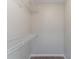 Walk-in closet with shelving for storage and organization at 847 Ashley Ln, Stone Mountain, GA 30087