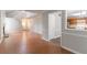 Open-concept floor plan with view of living room, staircase and kitchen area at 847 Ashley Ln, Stone Mountain, GA 30087