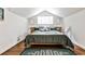Large bedroom under the eaves featuring hardwood floors and a dormer window for natural light at 1136 Moreland Se Pl, Atlanta, GA 30316