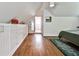 Bedroom featuring hardwood floors, large storage space, and a vaulted ceiling at 1136 Moreland Se Pl, Atlanta, GA 30316
