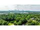 Scenic view of the Atlanta skyline, visible from the neighborhood surrounded by lush greenery at 1136 Moreland Se Pl, Atlanta, GA 30316