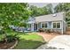 Charming home with a beautifully landscaped yard, welcoming front porch, and a cozy, inviting appeal at 1136 Moreland Se Pl, Atlanta, GA 30316