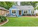 Quaint two-story home with a charming front porch, well-maintained lawn, and cozy curb appeal at 1136 Moreland Se Pl, Atlanta, GA 30316