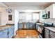 Well-equipped kitchen with stainless steel appliances, granite counters, and a convenient breakfast bar at 1136 Moreland Se Pl, Atlanta, GA 30316