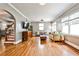 Bright living room featuring hardwood floors, light gray walls, and a seamless flow at 1136 Moreland Se Pl, Atlanta, GA 30316