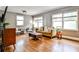 Cozy living room with hardwood floors, neutral walls, and stylish mid-century furniture at 1136 Moreland Se Pl, Atlanta, GA 30316