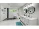 Large bathroom with walk-in shower, soaking tub, double vanity, and picture window for natural light at 1740 Dodson Sw Dr, Atlanta, GA 30311