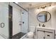 Modern bathroom with a glass-enclosed shower, vanity, and stylish fixtures at 1740 Dodson Sw Dr, Atlanta, GA 30311
