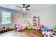 bedroom with a hardwood floor, window and toys at 1740 Dodson Sw Dr, Atlanta, GA 30311