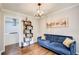 Charming sitting area showcasing hardwood floors and connecting to the open kitchen space at 1740 Dodson Sw Dr, Atlanta, GA 30311