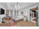 Bright main bedroom with a fireplace, ensuite bathroom, and lots of natural light at 201 Tweed Ct, Sugar Hill, GA 30518