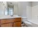 Practical bathroom layout featuring a vanity, sink, toilet, and bathtub/shower combo at 9119 Woodgreen Way, Jonesboro, GA 30238