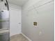 Neat laundry room with a shelf and connections for washer and dryer at 9119 Woodgreen Way, Jonesboro, GA 30238