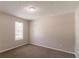 Bedroom with neutral walls, carpet flooring, window, and recessed lighting at 9542 Canvasback Ct, Jonesboro, GA 30238