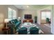 Comfortable living room with a large window, plush seating, and stylish decor at 9542 Canvasback Ct, Jonesboro, GA 30238