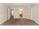 Spacious main bedroom with a tray ceiling and ensuite bathroom at 9542 Canvasback Ct, Jonesboro, GA 30238