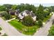 Charming two-story home with lush, green lawn and mature trees in a desirable neighborhood at 1023 Spruce Creek Ln, Lawrenceville, GA 30045