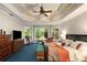 Spacious primary bedroom with large windows providing ample natural light and views of the backyard at 1023 Spruce Creek Ln, Lawrenceville, GA 30045