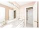 Bathroom featuring double sinks and granite countertops at 1305 Kelly Nelson Dr, Lawrenceville, GA 30043