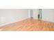 Spacious bedroom with hardwood floors and ensuite bathroom access at 1305 Kelly Nelson Dr, Lawrenceville, GA 30043