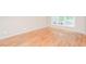 Bright, airy bedroom featuring natural light and hardwood floors at 1305 Kelly Nelson Dr, Lawrenceville, GA 30043