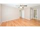 Large bedroom with hardwood floors and a ceiling fan at 1305 Kelly Nelson Dr, Lawrenceville, GA 30043