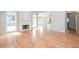 Spacious living room with hardwood floors and large windows providing ample natural light at 1305 Kelly Nelson Dr, Lawrenceville, GA 30043