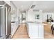Bright kitchen with stainless appliances, a long island, and natural light at 2575 Peachtree Ne Rd # 6G, Atlanta, GA 30305