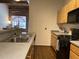 Stylish kitchen with stainless steel sink, modern appliances, and wood cabinets providing a functional cooking space at 320 Martin Luther King Jr Dr # 5, Atlanta, GA 30312