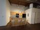 Kitchen area with bar, modern lighting, and ample cabinet space, offering both style and functionality at 320 Martin Luther King Jr Dr # 5, Atlanta, GA 30312
