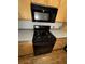 Modern kitchen stove is black, stainless steel and features a built-in microwave at 320 Martin Luther King Jr Dr # 5, Atlanta, GA 30312