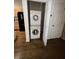 Bright laundry room features a stacked washer and dryer and nearby pantry at 320 Martin Luther King Jr Dr # 5, Atlanta, GA 30312