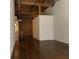 Open living space with hardwood floors and exposed brick walls creating a blend of industrial and modern styles at 320 Martin Luther King Jr Dr # 5, Atlanta, GA 30312