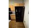 Modern kitchen refrigerator is black, has water dispenser, and offers a sleek design at 320 Martin Luther King Jr Dr # 5, Atlanta, GA 30312