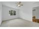 Bedroom features carpet, a ceiling fan, a large window and a closet at 3243 Northbrook Dr, Atlanta, GA 30341