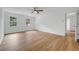 Bright bedroom with hardwood floors, two windows, ceiling fan, and ample natural light at 3243 Northbrook Dr, Atlanta, GA 30341