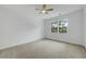Inviting bedroom with plush carpet, fan and large windows, offering a comfortable living space at 3243 Northbrook Dr, Atlanta, GA 30341