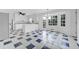 Spacious kitchen with an island, checkered floor, and lots of natural light at 3243 Northbrook Dr, Atlanta, GA 30341