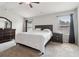 Main bedroom featuring dark furniture, neutral walls, and carpeted floors at 4172 Cedar Commons Way, Conley, GA 30288