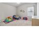 Bright bedroom featuring a vaulted ceiling, neutral walls, a window, and decor at 4172 Cedar Commons Way, Conley, GA 30288