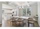 Dining area featuring recessed lighting, white table and chairs, and large windows at 4172 Cedar Commons Way, Conley, GA 30288