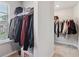 Bright walk-in closet with carpet, shelving and hanging racks at 4172 Cedar Commons Way, Conley, GA 30288