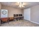 Finished basement space with a unique ceiling, tile flooring, and ample storage at 120 Majesty Ln, Fayetteville, GA 30215