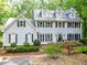 Charming two-story home featuring a landscaped yard, dormer windows, and a welcoming front entrance at 120 Majesty Ln, Fayetteville, GA 30215
