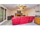 A casual living room has a brick fireplace, TV, wet bar, tile floors, and a walk out to the yard at 120 Majesty Ln, Fayetteville, GA 30215