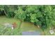 Aerial view of backyard and lush greenery surrounding the property at 2468 Dresden Ne Dr, Atlanta, GA 30341