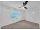 Bright bedroom with a modern ceiling fan and natural light at 2468 Dresden Ne Dr, Atlanta, GA 30341