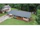 View of the front of the home from above, showing the yard and the street at 2468 Dresden Ne Dr, Atlanta, GA 30341