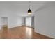 Spacious living room with hardwood floors, neutral walls, and large window at 2468 Dresden Ne Dr, Atlanta, GA 30341